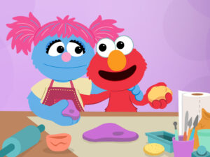 Elmo and Jesse making crafts.