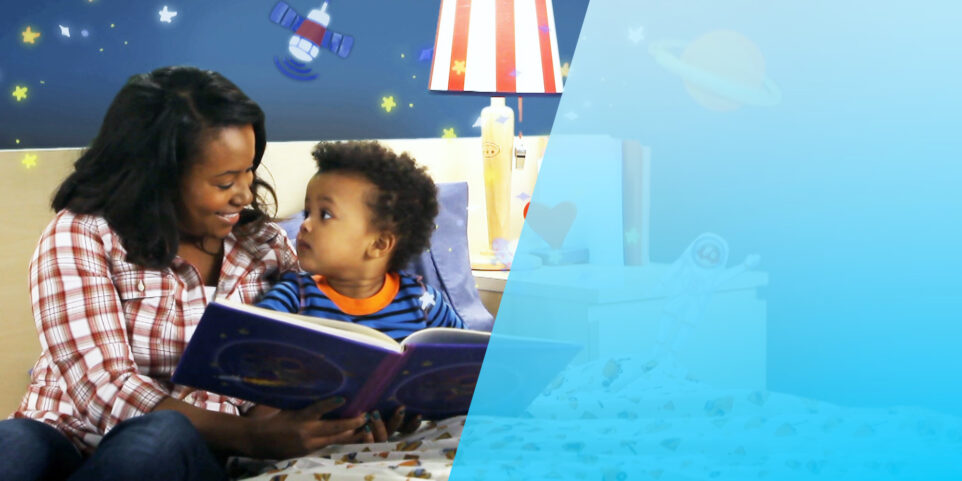 A mother reads to her child.
